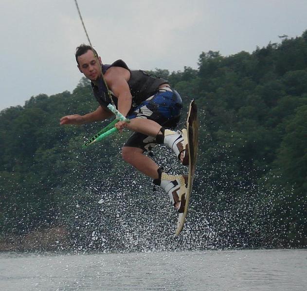 Catch some mad air while jumping some awesome wake at the lake Catch some mad air while jumping some awesome wake at the lake Photos