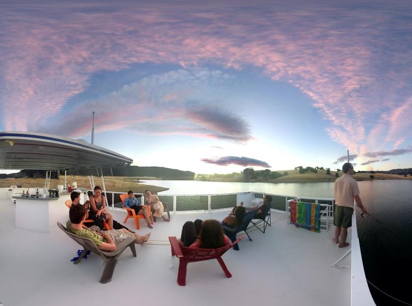 Reconnect with friends and family on the houseboat's top deck