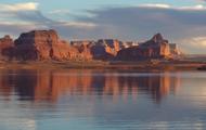 Red canyons fill the blue open sky providing a most astonishing view