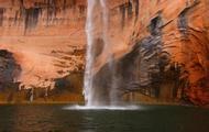 Leftover rain offers a sense of waterfalls cascading off canyons