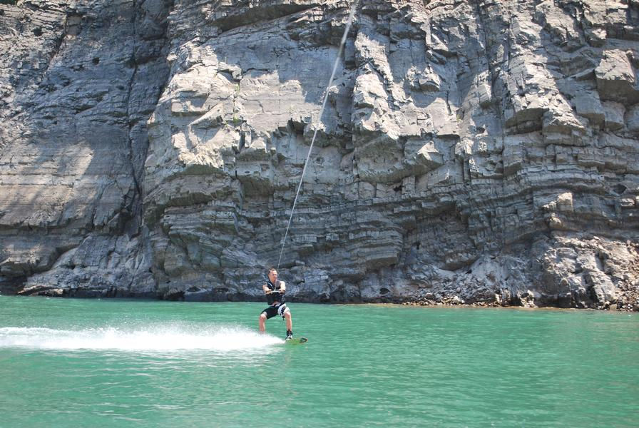 Towering cliffs offer a picturesque background while riding the waters