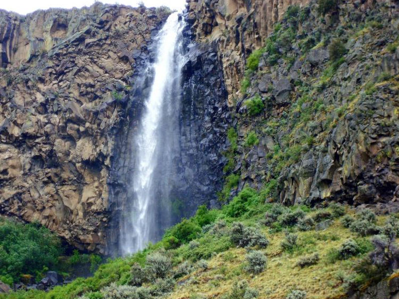 A waterfall is a stunning sight at a desert lake Photos