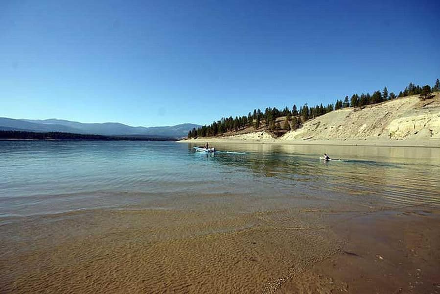 Board a powerboat at shore and set out for open water