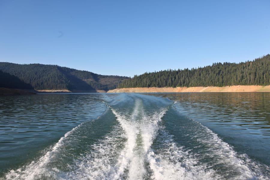 Enjoy the view from the back of the houseboat while basking in the sun