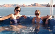 Relax with friends while soaking in the hot tub on the top deck