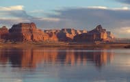 Red canyons fill the blue open sky providing a most astonishing view