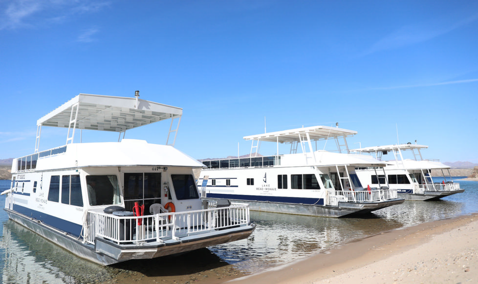 Houseboats on a sandy beach