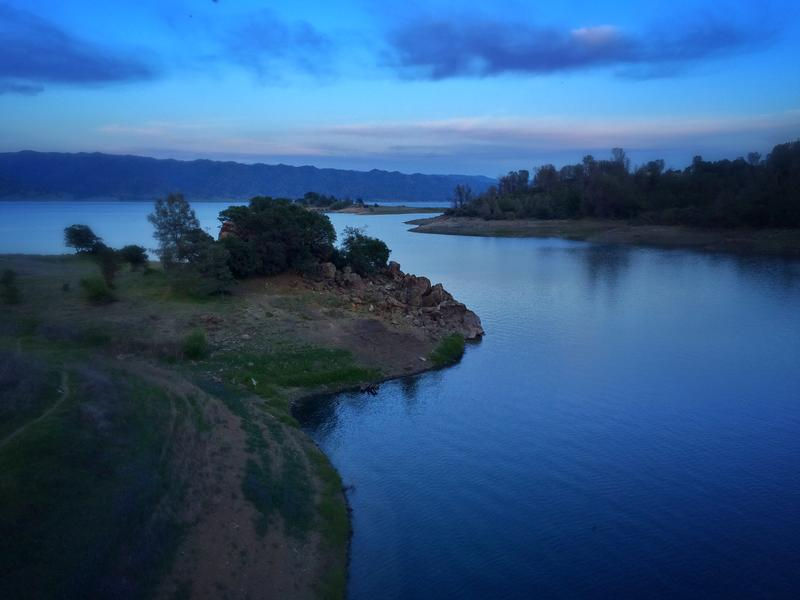 The calm that comes at dusk reflects on glassy waters