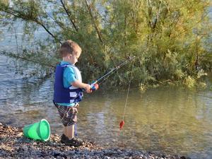 Teaching Your Kids to Fish During Your Houseboat Vacation