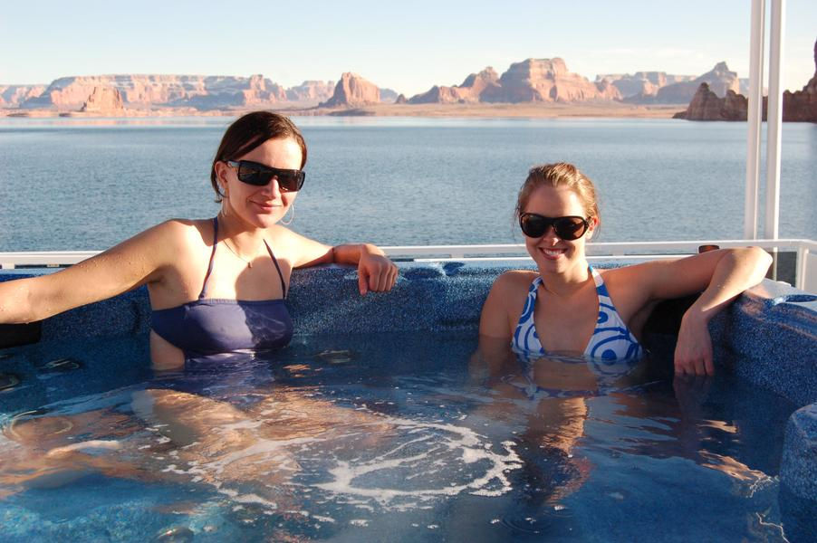 Relax with friends while soaking in the hot tub on the top deck