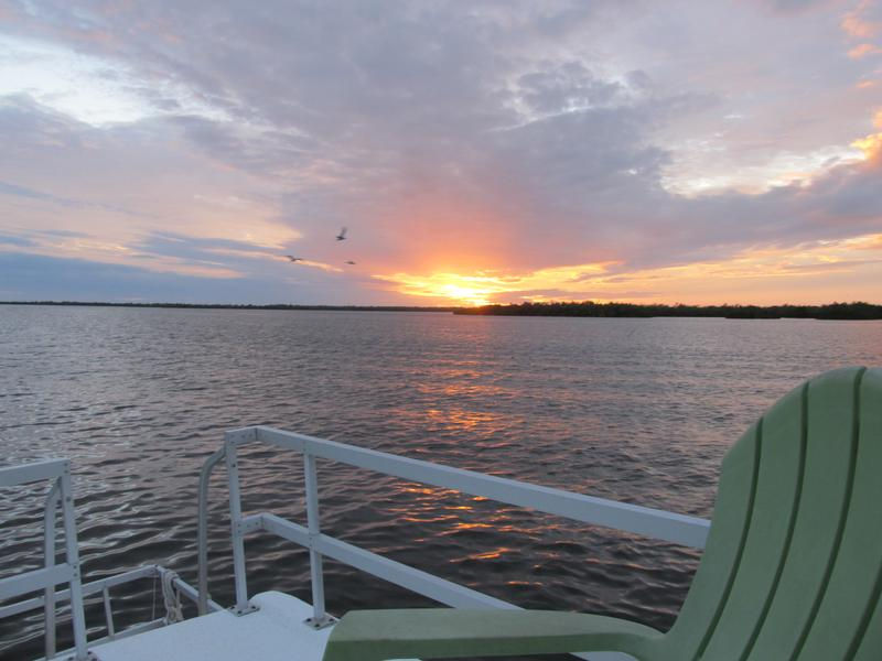 Kick back and relax on the top deck as you enjoy a beautiful sunset