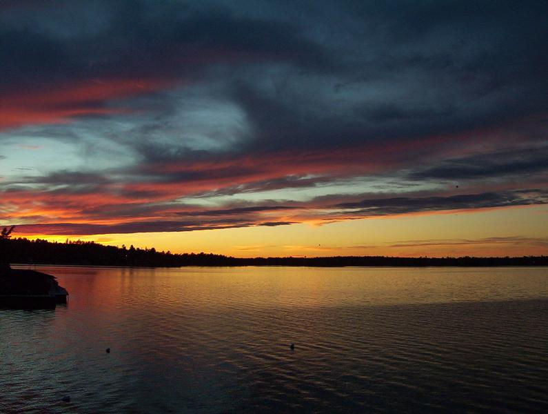 The kind of vibrant and stunning sunset you can expect on your trip