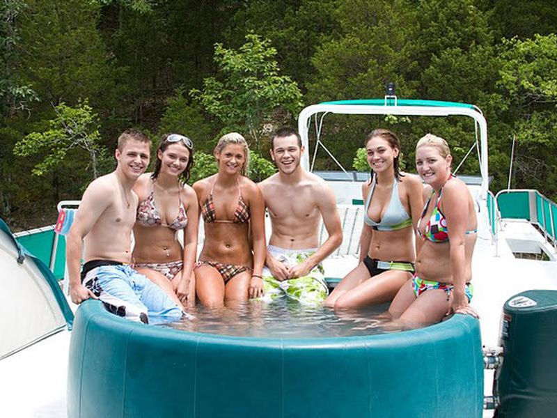 Take to the hot tub with friends on your houseboat's top deck Photos
