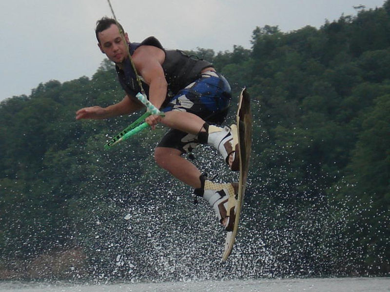Catch some mad air while jumping some awesome wake at the lake Catch some mad air while jumping some awesome wake at the lake Photos