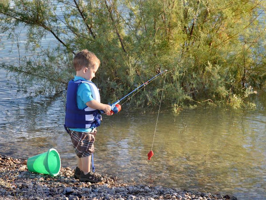 Bring along the fishing poles and have the kids help catch dinner