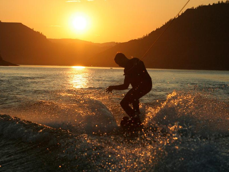 Wake boarding at sunset makes for striking memories Photos